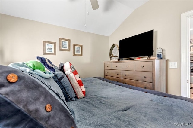 bedroom with lofted ceiling and ceiling fan