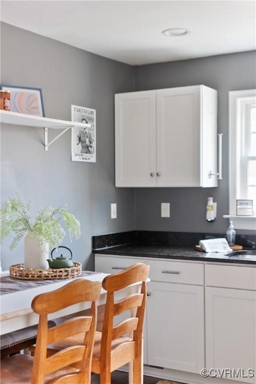 kitchen with white cabinets