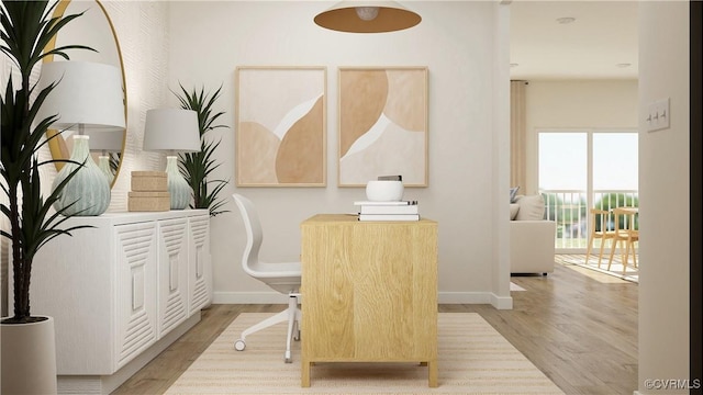 dining area with light wood-type flooring