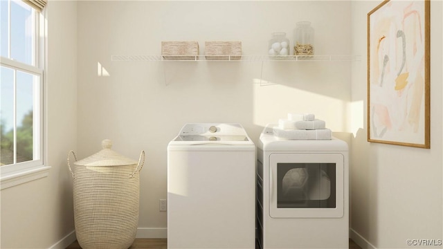 laundry room with washer and dryer