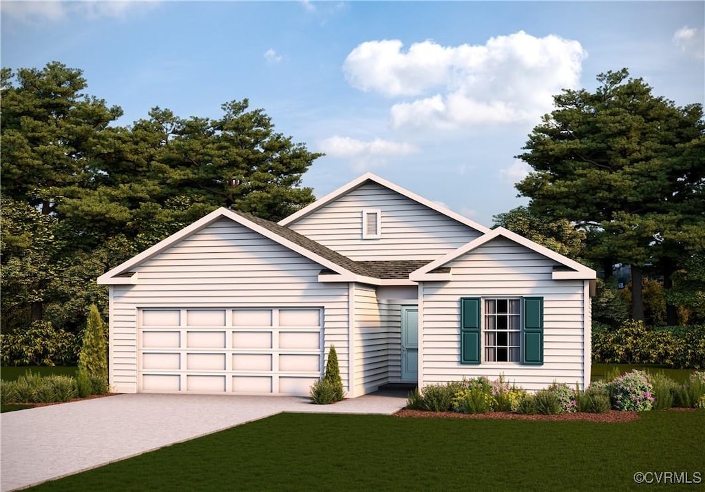 view of front of property with a garage and a front lawn