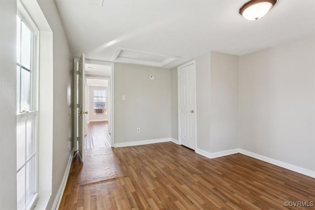 empty room featuring wood-type flooring