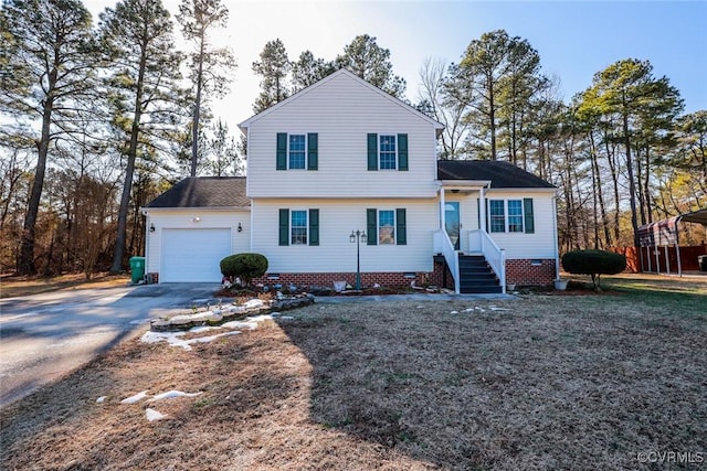 view of front of property featuring a garage