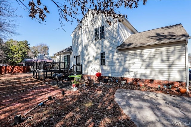 view of home's exterior with a gazebo