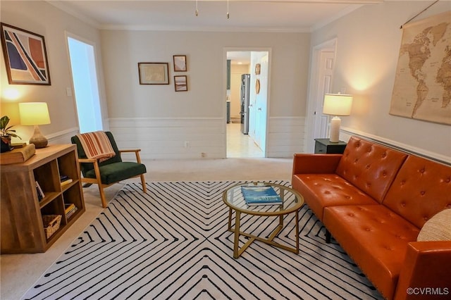 living room with ornamental molding