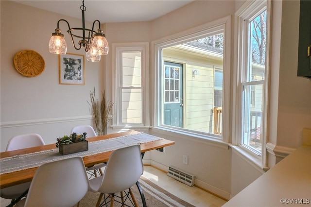 dining room featuring an inviting chandelier