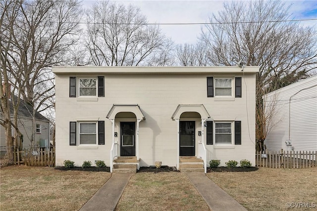 view of front facade with a front lawn