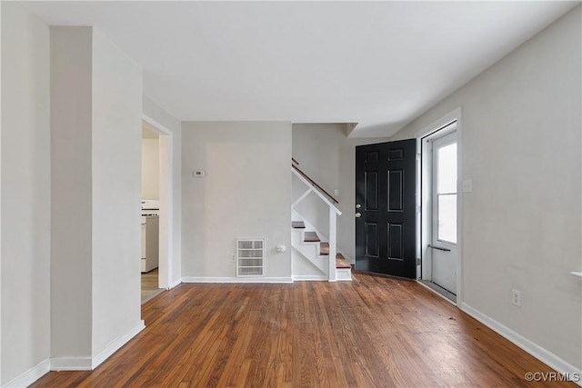 foyer with hardwood / wood-style flooring