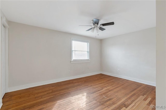 unfurnished room featuring hardwood / wood-style floors and ceiling fan