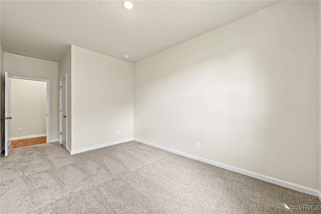 view of carpeted spare room