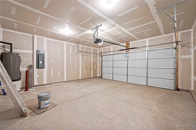 garage with a garage door opener, electric panel, and electric water heater