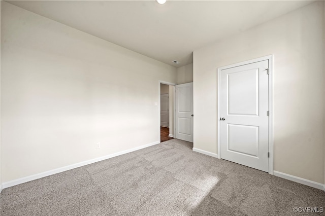 unfurnished bedroom featuring carpet floors