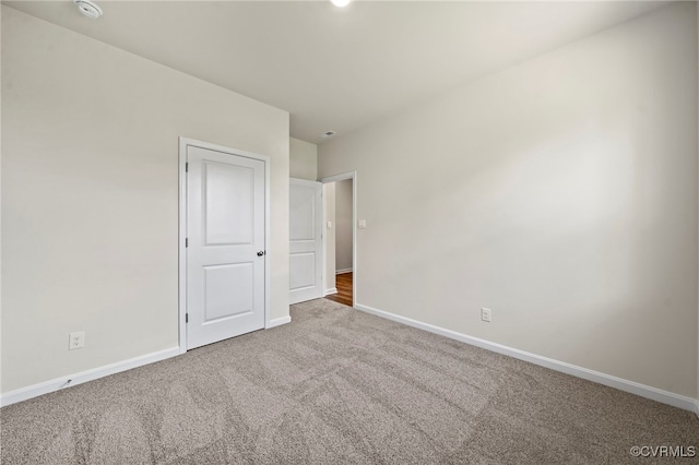 unfurnished bedroom with carpet