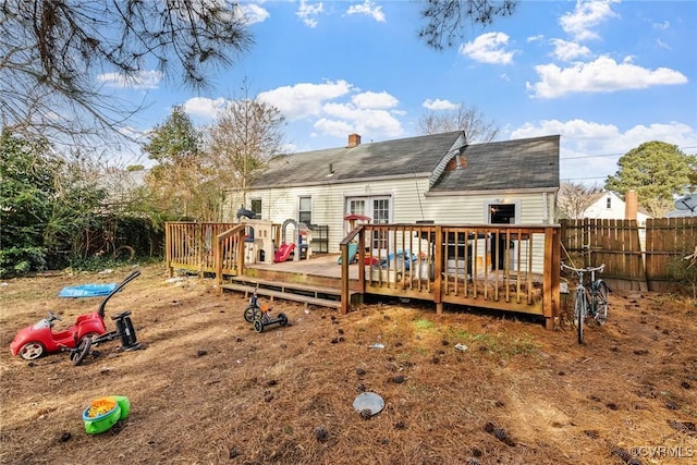 rear view of property with a deck