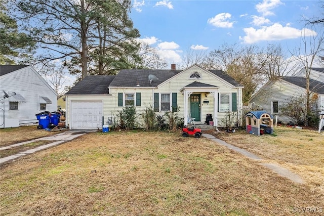 view of front facade featuring a garage and a front yard