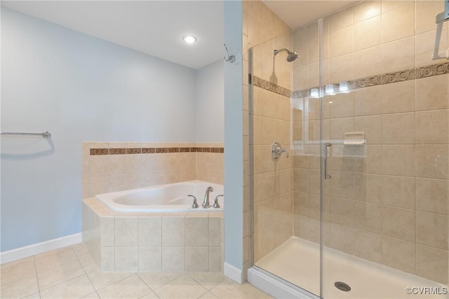 bathroom with plus walk in shower and tile patterned floors