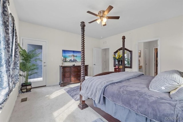 bedroom with ceiling fan, light carpet, and access to outside