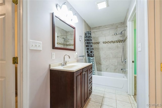 bathroom with tile patterned floors, vanity, and shower / bath combo