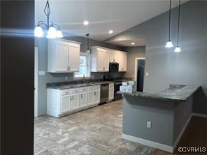 kitchen with white cabinetry, decorative light fixtures, range, stainless steel dishwasher, and kitchen peninsula