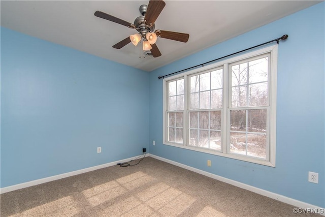 unfurnished room with carpet floors and ceiling fan