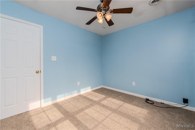 unfurnished room featuring carpet and ceiling fan