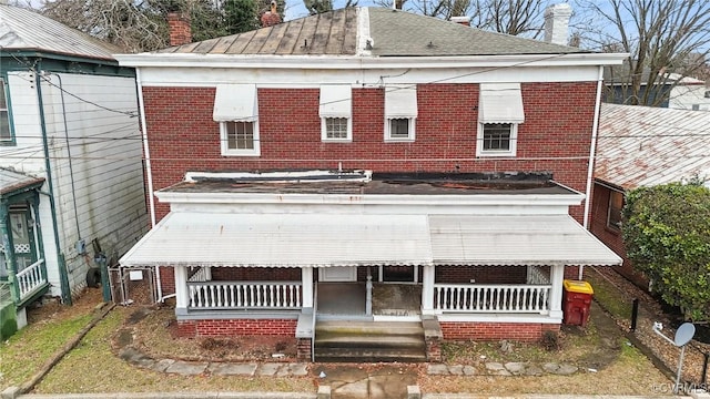 view of front facade featuring covered porch