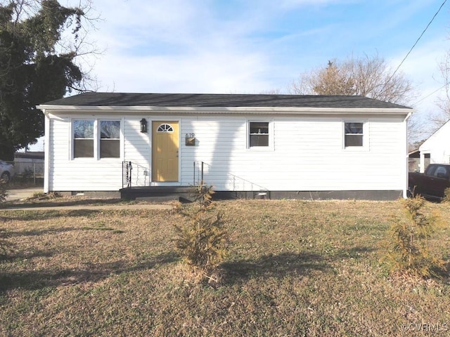 ranch-style house with a front yard