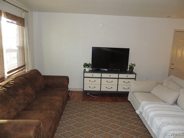 living room with dark wood-type flooring