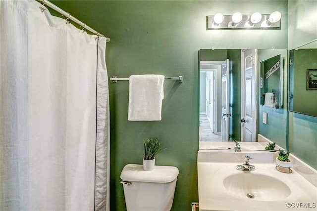 bathroom with sink and toilet