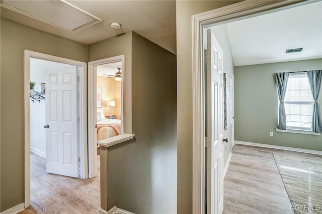 hall featuring light hardwood / wood-style flooring