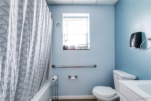 full bathroom with vanity, shower / bath combination with curtain, and toilet