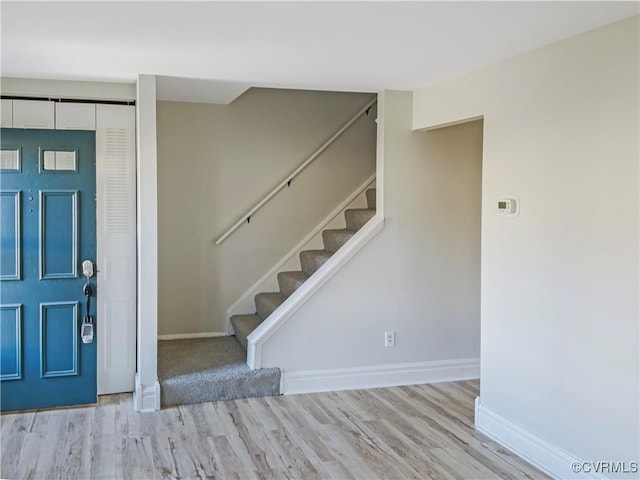 entrance foyer featuring light hardwood / wood-style floors