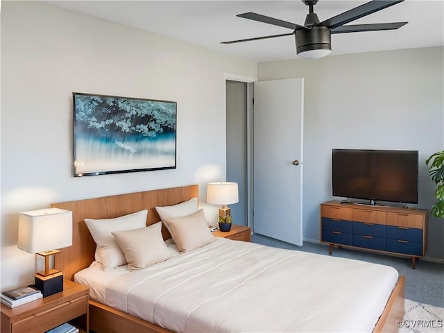 bedroom with light colored carpet and ceiling fan