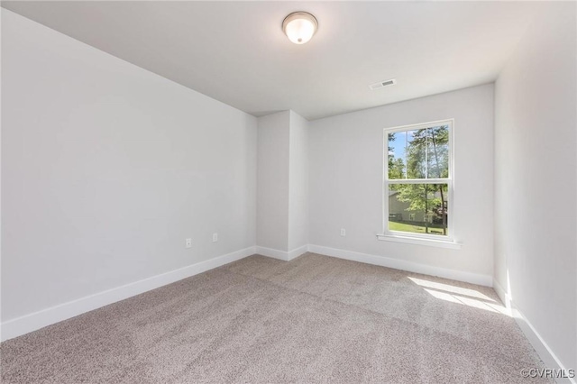 empty room featuring carpet flooring