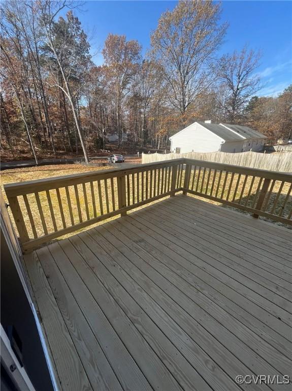 deck featuring a lawn