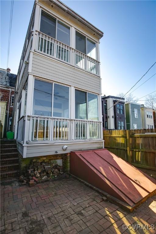 rear view of house featuring a patio area