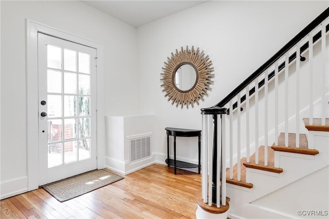 foyer entrance featuring light wood-type flooring