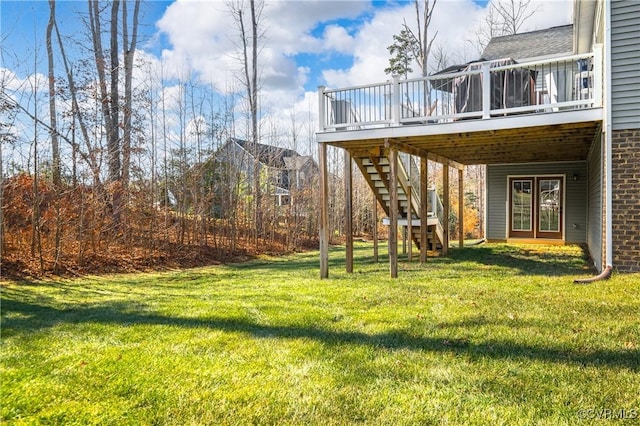 view of yard featuring a wooden deck