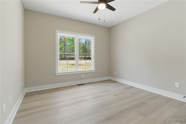2280 Hensley Rd, Mineral, VA 23117 - spare room featuring light wood-type flooring, a ceiling fan, and baseboards