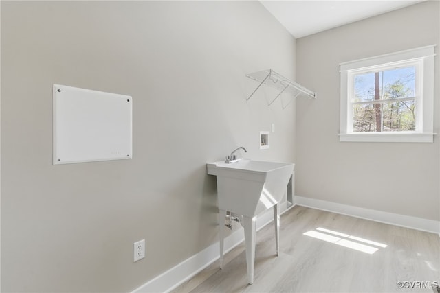 2280 Hensley Rd, Mineral, VA 23117 - laundry area with baseboards, light wood-style flooring, and hookup for a washing machine