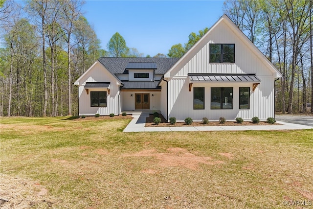 2280 Hensley Rd, Mineral, VA 23117 - modern farmhouse featuring a standing seam roof, french doors, metal roof, and a front lawn