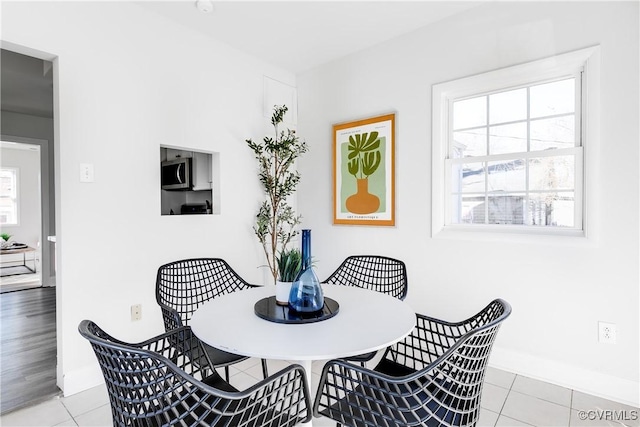 view of tiled dining space