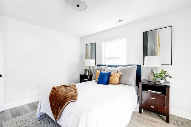 bedroom featuring light wood-type flooring