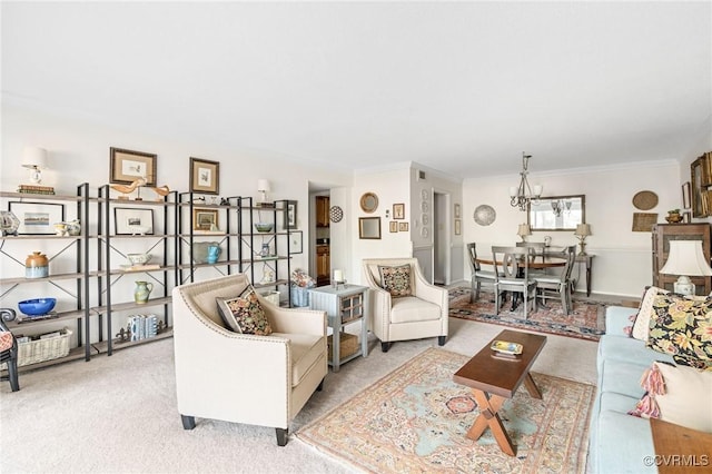 living room with light carpet, a notable chandelier, and ornamental molding