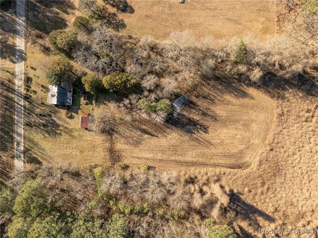 birds eye view of property with a rural view