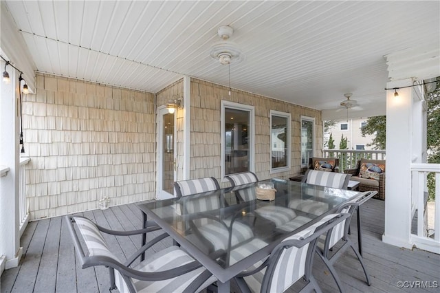 wooden deck with ceiling fan