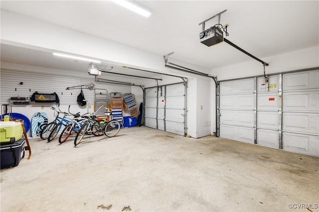 garage featuring a garage door opener