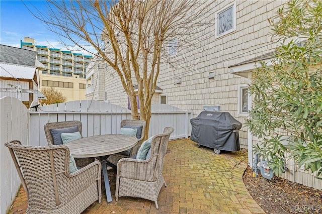 view of patio / terrace featuring a grill