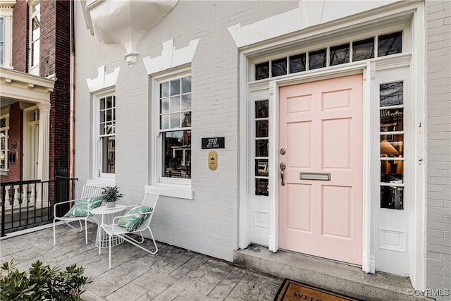 entrance to property with covered porch