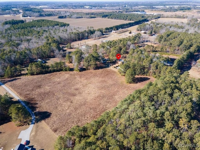 birds eye view of property with a rural view